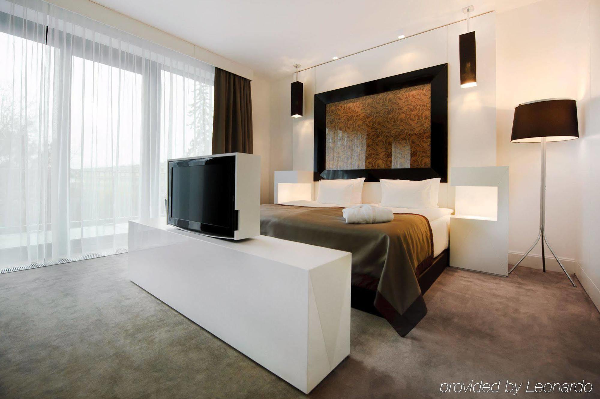 ホテル プラチナム パレス ヴロツワフ 部屋 写真 A bedroom